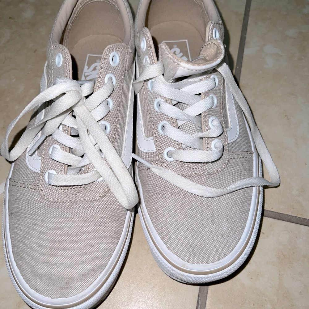 Tan and white vans